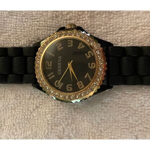 Ladies Geneva Jelly strap watch in black. Gold trim. New condition.